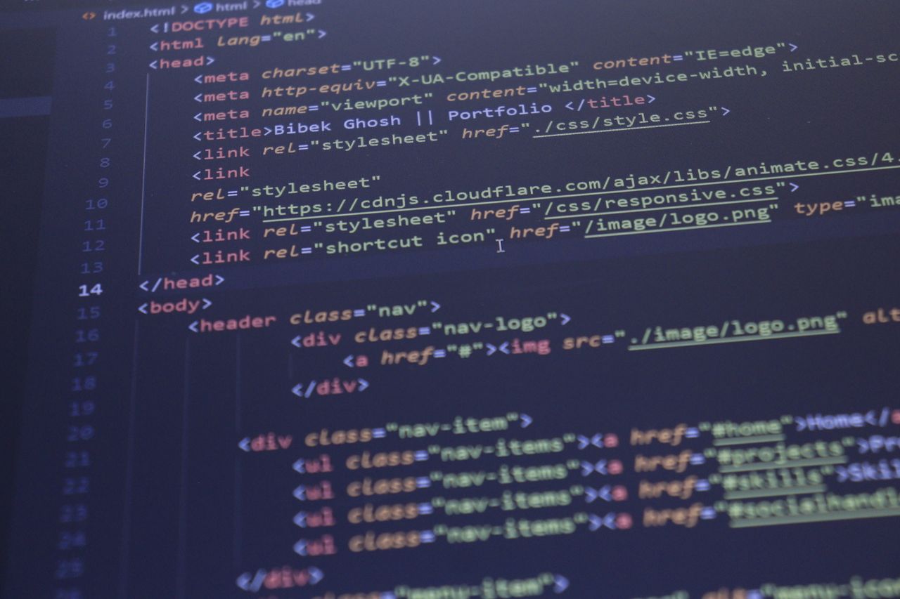 services-03 Close-up view of HTML and CSS code displayed on a computer screen, ideal for programming and technology themes.